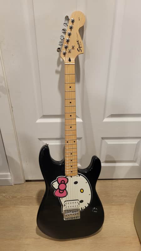$1100 Squier Hello Kitty Stratocaster Electric Guitar – Black image 1