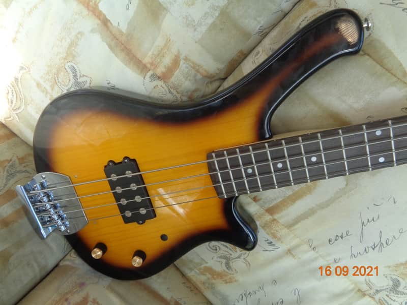 Bass guitar: Ricky styled musicman bridged custom made bass image 1