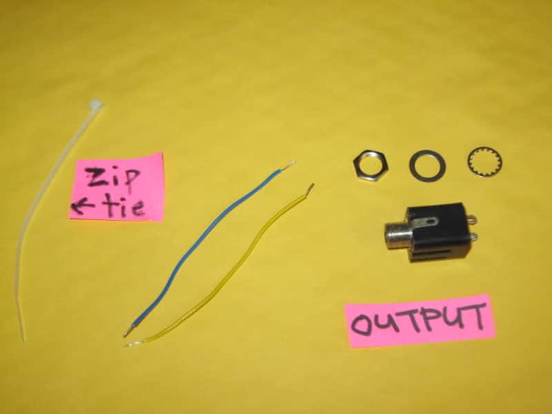 ONE lightly used genuine Boss OUTPUT jack + wires, nut, washers, & zip tie - specifically from 2009 (but can be used on other year BOSS pedals) NO pedal / NO other parts (let me know if wires need to be soldered on for you) image 1
