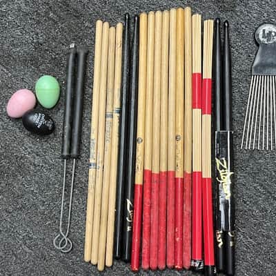 Multi-Brand Percussion Pack: 3 Egg Shakers / 2 Pairs Promark 716 Timbale Sticks / 2 Pairs Select Hickory Zildjian 5A / Zildjian Steel Brushes / 5 LP Mark Quinones Rock Sticks / 1 Pair Pro Mark Hot Rods / 1 LP Guiro Scraper image 1