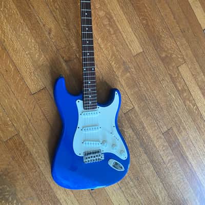 Bright blue Hondo Stratocaster electric guitar image 1