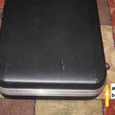 used Rickenbacker Hardshell Case for Model 620 electric guitar (NO guitar) from 1995, 2 Ball feet broke off (2 holes in plastic), Exterior plastic has some cracks,  EXT: Black Hard Plastic / Chrome HW / Handle: Black Molded Hard Plastic / INT: Blue Plush image 22