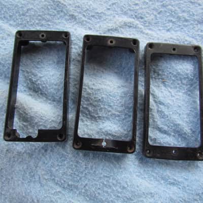 Gibson M-69 Pickup Surrounds Lot Of 3 Gibson M-69 Pickup Surrounds Poor Condition 1 Neck & 2 Bridge Pickup Rings Labeled M-69 Vintage Pickup Surround Neck & Bridge Positions View All Photos Closely image 1