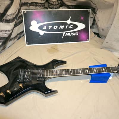B.C. Rich Deluxe Series Warlock Guitar with Case Black BC Rich image 1