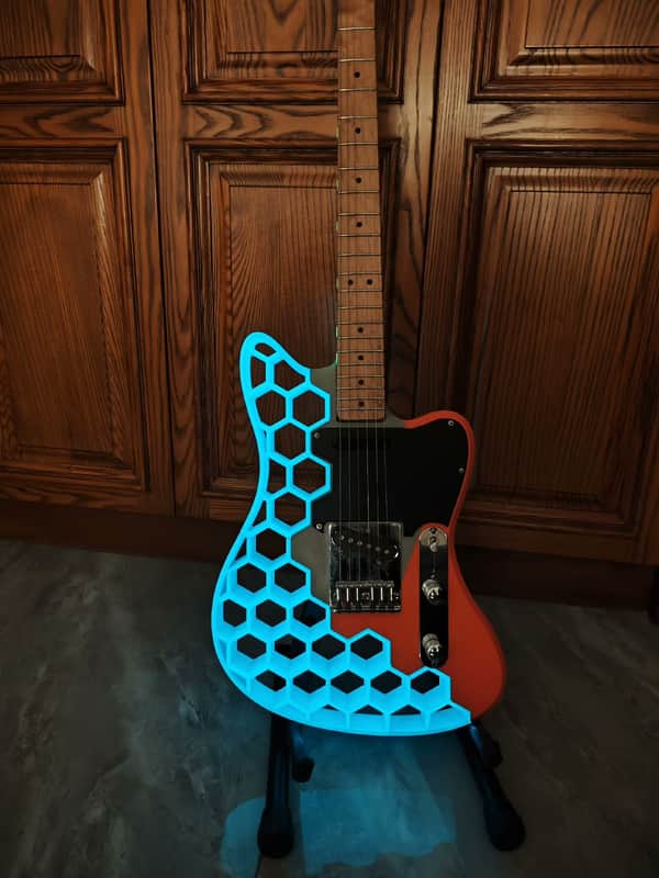 3D Printed Guitar Body with a Glowing Effect. image 1