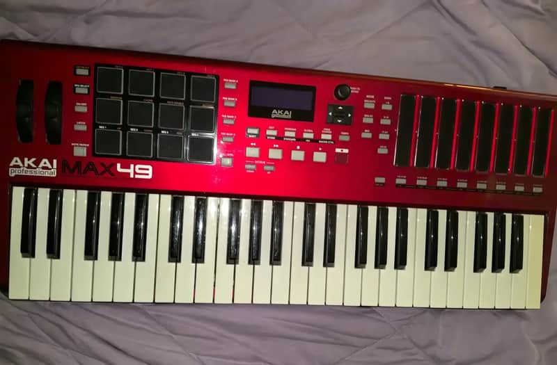 Akai MAX49 Keyboard Controller 2010s - Red image 1
