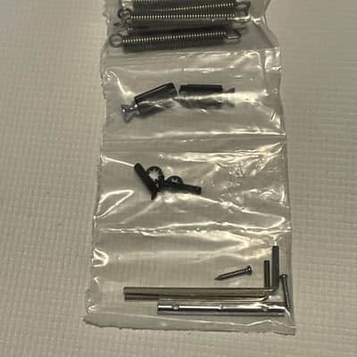 2010's Era New in Package Original Floyd Rose Studs & Bushings, 7 String Retainer Bar, Claw & Springs ++