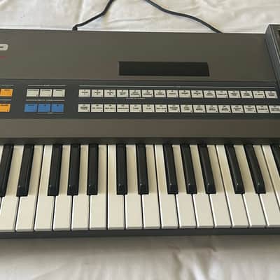 Roland JX-8P 61-Key Polyphonic Synthesizer with PG-800 Programmer 1984 - 1986 - Black