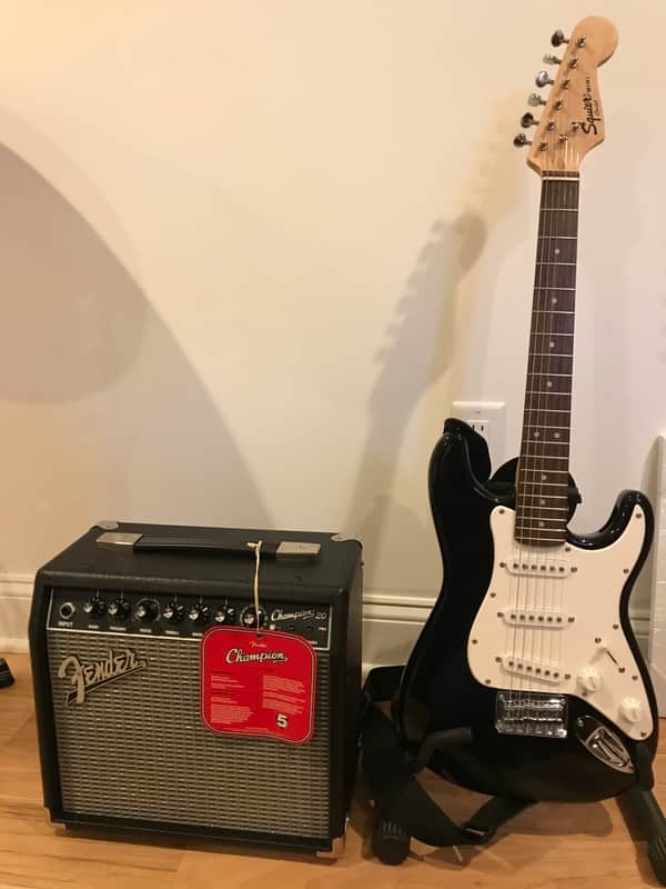 Squire and Fender Stratocaster and Champion 20 amp. 2017 Black image 1