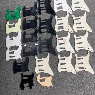 Unknown Lot of 23 misc. Strat/Tele Pickguards - Black/White/Mint/Green/Cream etc. image 1