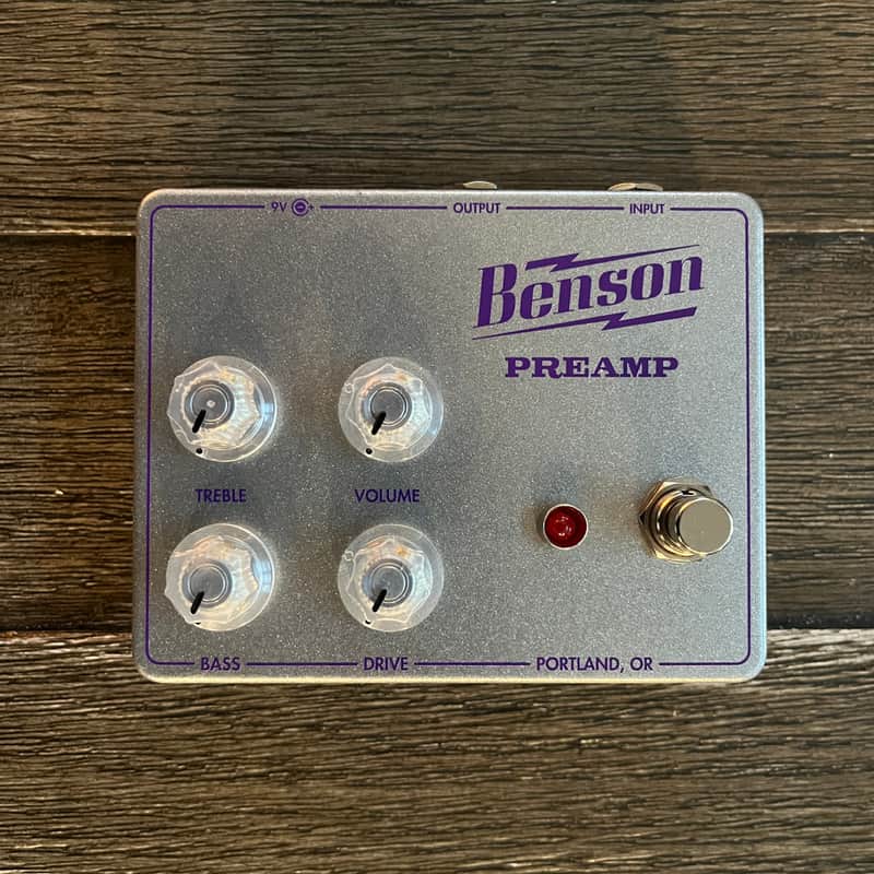 Blue Benson preamp pedal with knobs for treble, volume, bass, and drive.