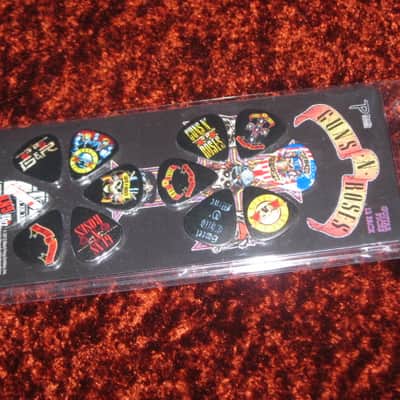 new in package (old stock) A+ Perri's Leather Ltd. / Perri's 12 Pack Of Guns N Roses Guitar Picks - Med Gauge - Celluloid Plastic, 351 shape - but slightly curved (LP12-GNR1) LP12GNR1 image 11