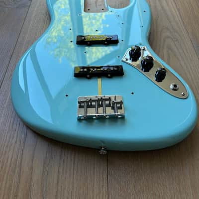 Original and complete 2014 Fender AVRI '64 Jazz Bass Body - Daphne Blue - LOADED image 6