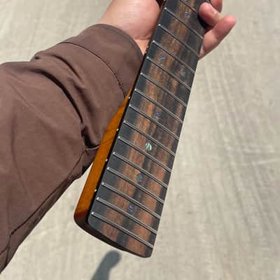 5a Striped Ebony Fretboard 22frets 5a Roasted flame Maple guitar neck Radius 12inch Round stainless steel 22 frets Roasted flame Maple guitar neck Striped Ebony fingerboard 25.5inch hole 10mm Radius: 12 inches. image 7