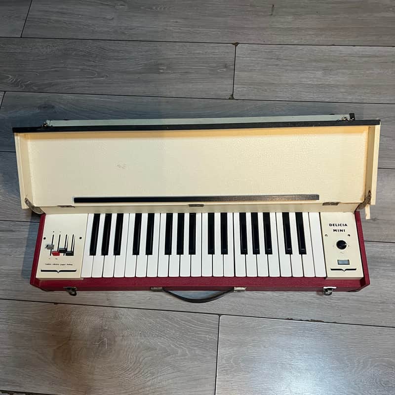 Delicia Mini 807 vintage czech combo organ 1970s working red case 1721 1970s image 1