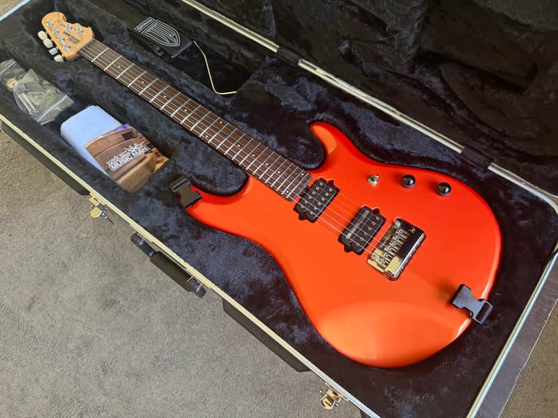 Ernie Ball Music Man John Petrucci Signature JP6. Tangerine Pearl. image 1