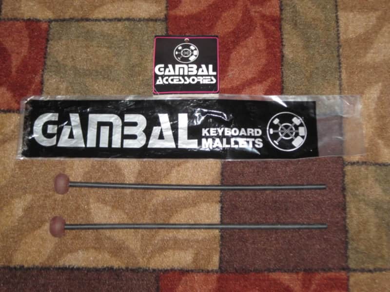 one pair new old stock Gambal Manufacturing GPHR1 (UG13GPHR1) Percussive Keyboard Mallets (for xylophones and glockenspiels) 1 & 1/8" Brown Medium Nylon Flat Ball (oval) Heads with Black Synthetic Shafts (with original packaging) from 1990s to early 2000s image 1