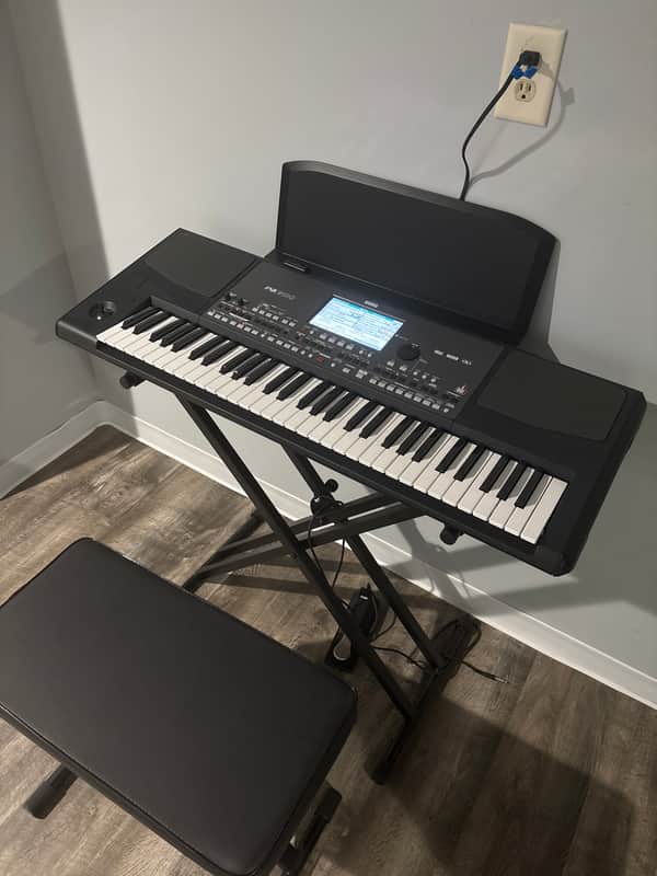 Korg Pa600 61-Key Keyboard w/ bench, stand, pedal, and headset image 1