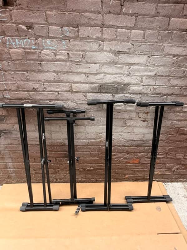 Various Piano Stands Including Two on Stage Stands image 1
