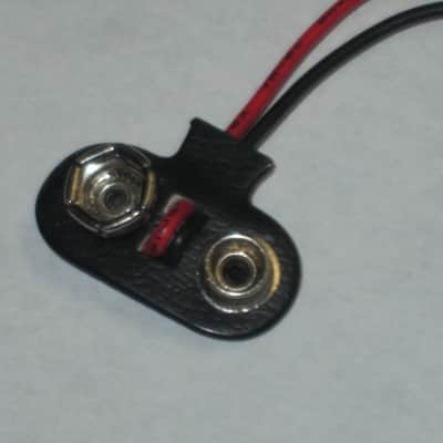 ONE very lightly used genuine Boss 9v battery clip [specifically for Boss pedals that use battery clip with black plastic covering near the terminal part (which are most of them) - but can be a replacement for the gray battery clip] image 17