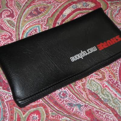 lightly used very clean 1980s Shure microphone pouch, outer areas are black vinyl with a very light reptile texture/appearance & one area has a red & silver graphic / inside is black / black zipper (NO microphone) 10 inches W, 4 & 1/2 inches H image 13