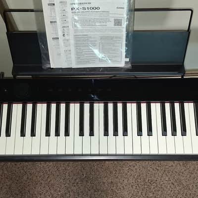 Casio PX-S1000 Privia 88-Key Slim Digital Console Piano with Flight Case and Stand