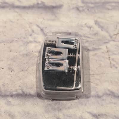 Unknown Set of Six Fender Style Block Saddles image 1