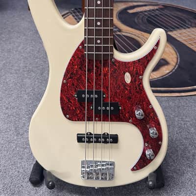 Peavey Milestone 4-String Electric Bass with Hardshell Case - Ivory image 3