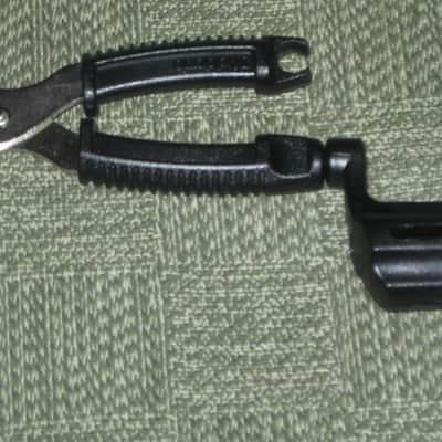 new (no package) very near A+ D'Addario Planet Waves PRO-WINDER Black String Winder & Cutter & Bridge Pin Puller DP0002 for guitar, mandolin, ukulele & banjos (black hard plastic with hardened steel wire cutters) just has few minor natural imperfections image 17
