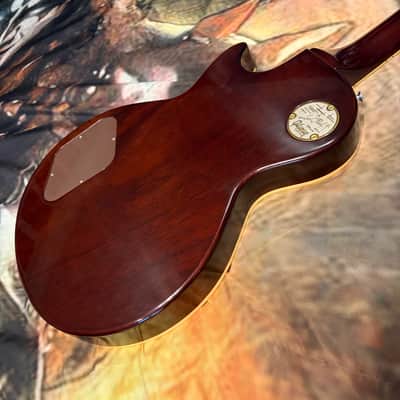 FANCY 💃! 2026 Gibson Custom Shop '76 Les Paul Deluxe Reissue Rocket Red Sparkle Top VOS Limited Edition LE 1976 Standard Norlin Era Mini Humbuckers Maple Neck Sandwich Body Construction ABR-1 Bridge Chrome Hardware Cream Plastics Brown Walnut Body image 3