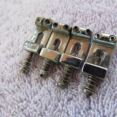 Vintage Fender Stratocaster Bridge Saddles Set Of 4 1970's Era Fender Stratocaster Bridge Saddles Part Number 027037 Set Of 4 image 1