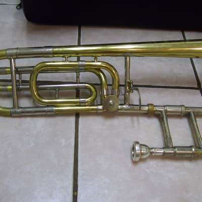 New Gold color trigger trombone,  With case and mouthpiece image 3