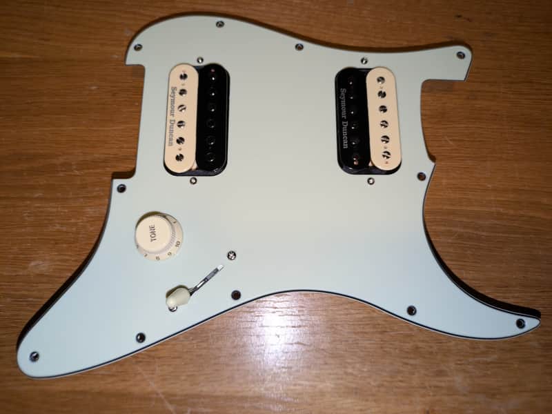 Stratocaster pickguard with Seymour Duncan Distortion pickups and Ibanez 5-way switching