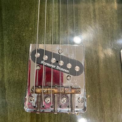 Wanderkauven Electric guitar - Transparent green burst finish with visible wood grain image 7