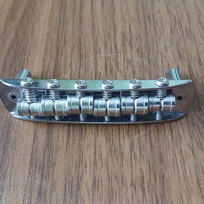 Fender 008-12 Mustang Guitar Bridge with Bridge Posts 2010s - Chrome image 2