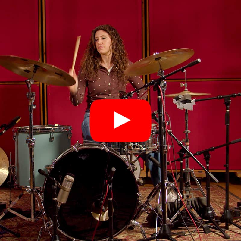 Jessica sitting at the drum kit