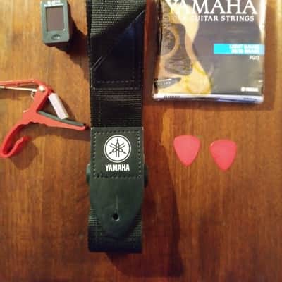 Yamaha SCF04 full size guitar with gig bag, electronic tuner, strap, capo, picks,  set of strings image 10