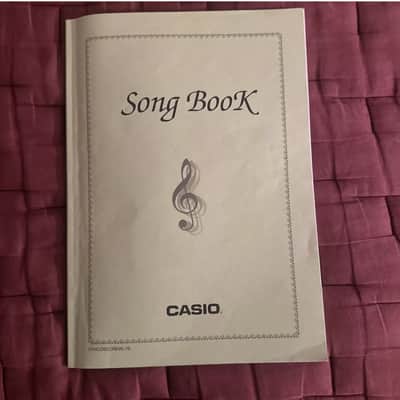 The Casio Song Bookl, 07HCOSCOREWWL1B Score For Piano And C instruments