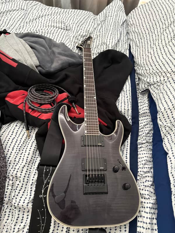ESP LTD MH-1000 Evertune with Ebony Fretboard 2017 - Present - See Thru Black image 1