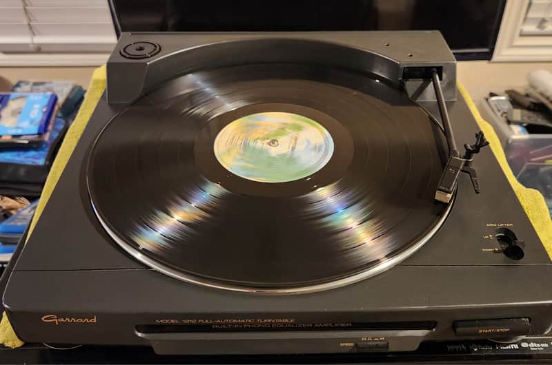 Garrard Garrard 1212 is a vintage, fully automatic belt-drive turntable 90s  - Black