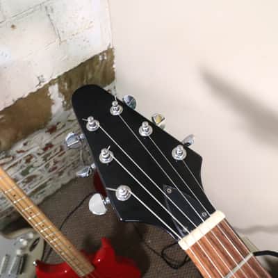 Flying V Style Electric Guitar in Black with White Pickguard image 16