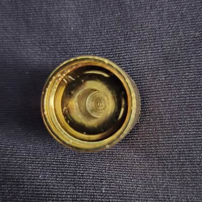 Gold and yellow tone knob with screw image 3