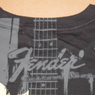 new with Fender paper hang tag A+ shape genuine Fender Custom Shop "Taking Over Me" Size XX-Large (XXL) short sleeve T-Shirt, 100% Cotton -- Black Shirt with Distressed Tan, Gray, & Black Graphic -- Fender P.N (part #): 9101020806 image 10