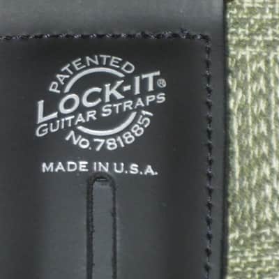 very lightly used Lock-It LIS-001-P2-BLK POLY PRO SERIES Black 2" guitar strap (2" wide, black polypropylene material, patented and brilliant Lock-It strap locking system, leather ends) straps, extend to an extra long 62" in max length image 3