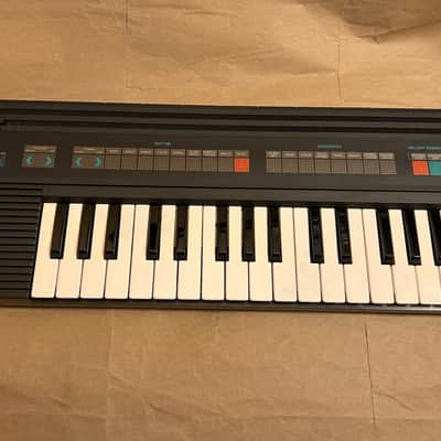 Yamaha PSS-120 PortaSound pss120 Synth Keyboard Made in Japan in Very Good Condition with Users Manual booklet