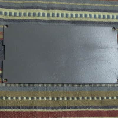 used Boss bottom plate (NO: rubber padding,label,serial number) for compact sized pedal - specifically from mid 1980s - metal, OUTER side: semi-gloss gray fiish / INNER side: flat gray finish -- back end has factory made small cut out for power jack image 10