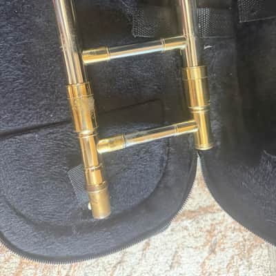 Immagine Gold color trigger trombone, With case and mouthpiece. Large bore - 12