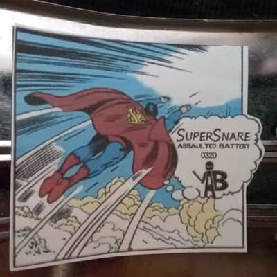 Pearl Export custom Assaulted Battery two color Superman themed graphics over a blue sparkle wrap. image 7