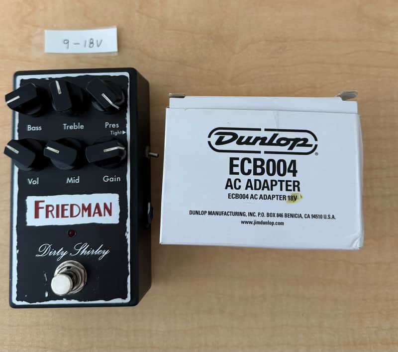 Black and silver guitar effects pedal with knobs and "Friedman Dirty Shirley" text.