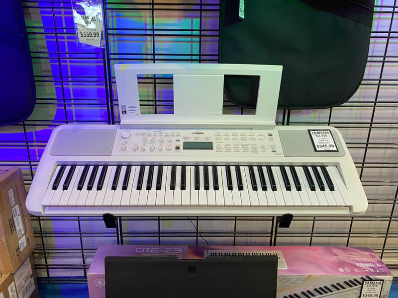 Yamaha EZ-300 61-Key Portable Keyboard with Light-Up Keys 2020 - Present - Silver image 1